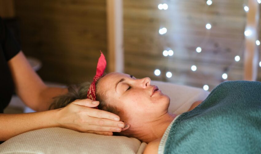 Yolanta providing a Reiki healing in Peterborough.